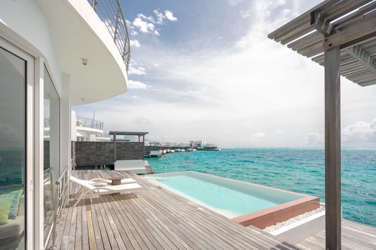 Maldivian resort villa with infinity pool