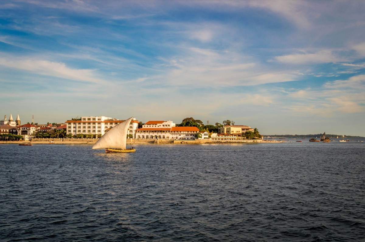 Sailboat and resort at distance