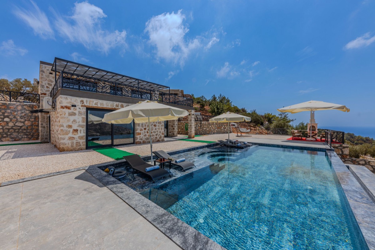 Tweede foto: luxueus eilandhotel met privaat pool en zeeblik
