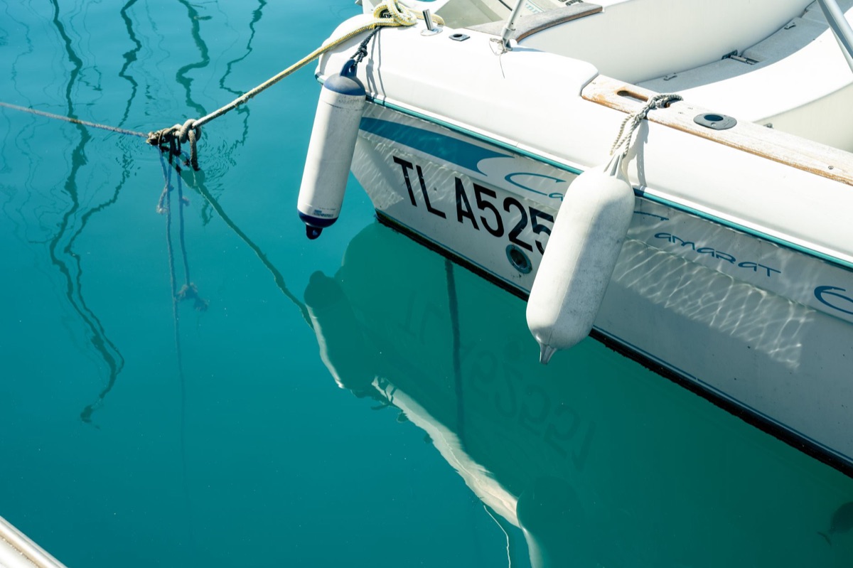 Yacht Mooring with Sunlit Water